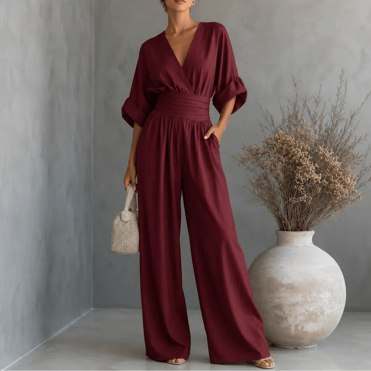 Wide-Leg Jumpsuit with V Neck and Pleated Waist Sash