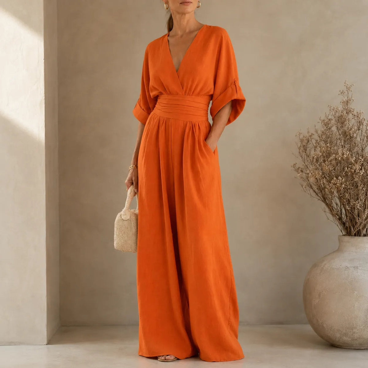 Wide-Leg Jumpsuit with V Neck and Pleated Waist Sash