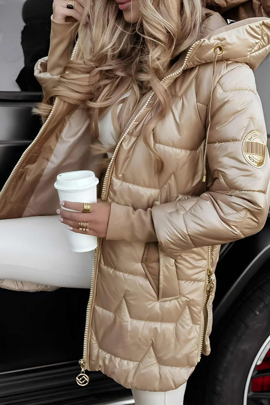 Long Hooded Puffer Jacket with Quilted Shell and Side Zip Vents